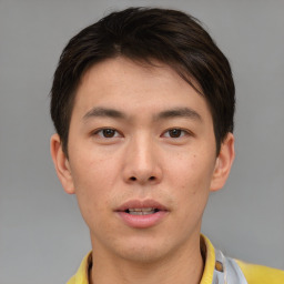 Neutral asian young-adult male with short  brown hair and brown eyes