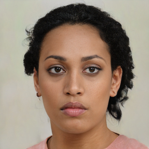 Neutral latino young-adult female with long  black hair and brown eyes