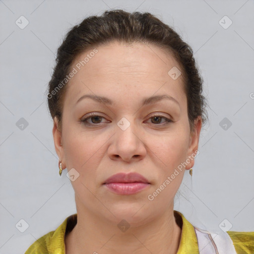 Joyful white adult female with short  brown hair and brown eyes