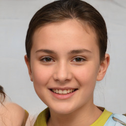 Joyful white child female with short  brown hair and brown eyes