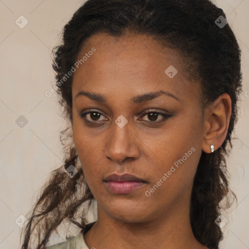 Neutral black young-adult female with long  brown hair and brown eyes