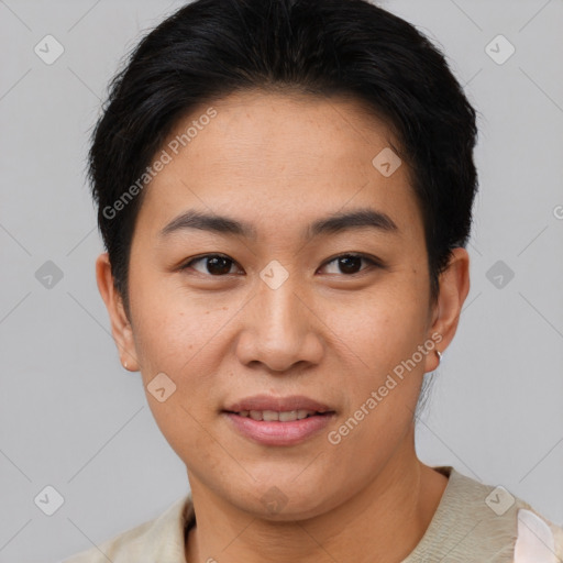 Joyful asian young-adult female with short  brown hair and brown eyes