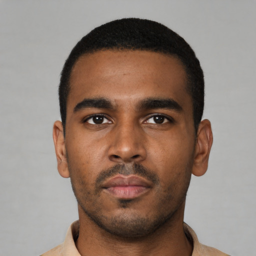 Neutral black young-adult male with short  black hair and brown eyes
