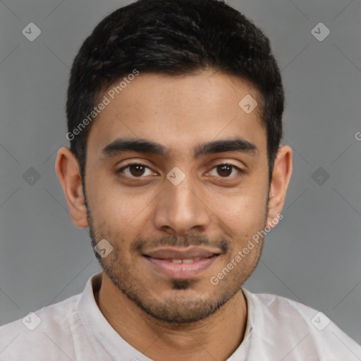 Joyful latino young-adult male with short  brown hair and brown eyes