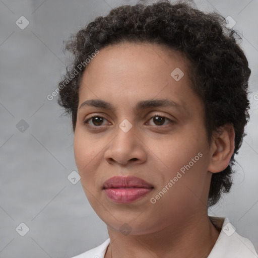 Joyful latino young-adult female with short  brown hair and brown eyes