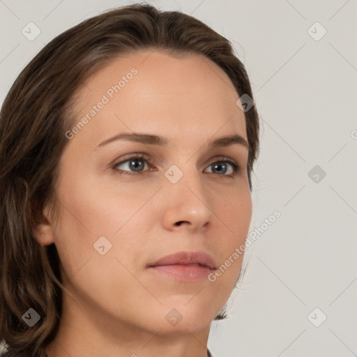 Neutral white young-adult female with medium  brown hair and brown eyes