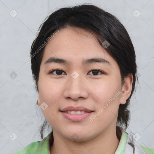 Joyful asian young-adult female with medium  brown hair and brown eyes