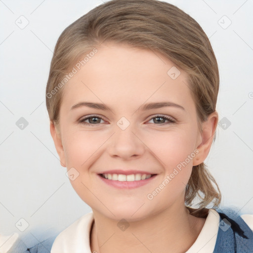 Joyful white child female with medium  brown hair and brown eyes