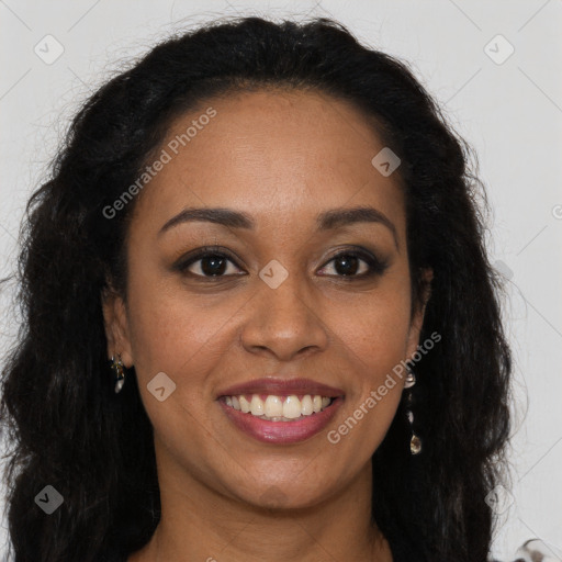 Joyful black young-adult female with long  brown hair and brown eyes