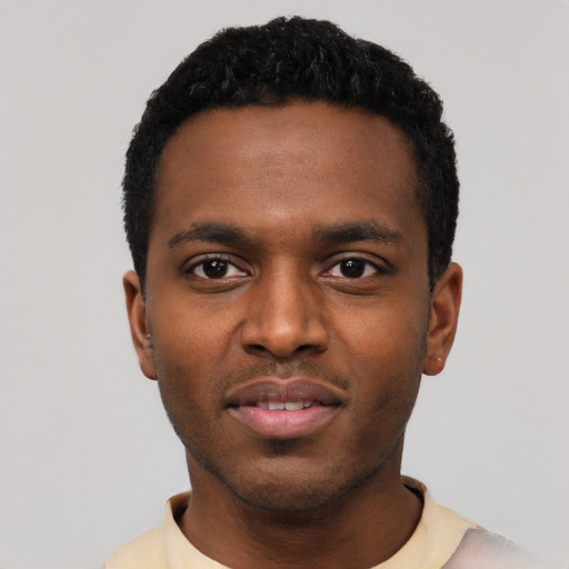 Neutral black young-adult male with short  black hair and brown eyes