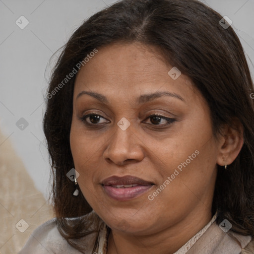 Joyful white adult female with long  brown hair and brown eyes