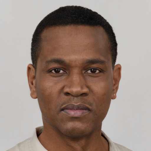 Neutral black young-adult male with short  brown hair and brown eyes