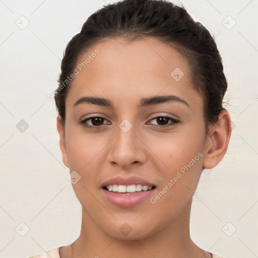 Joyful white young-adult female with short  brown hair and brown eyes