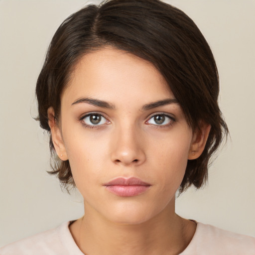 Neutral white young-adult female with medium  brown hair and brown eyes