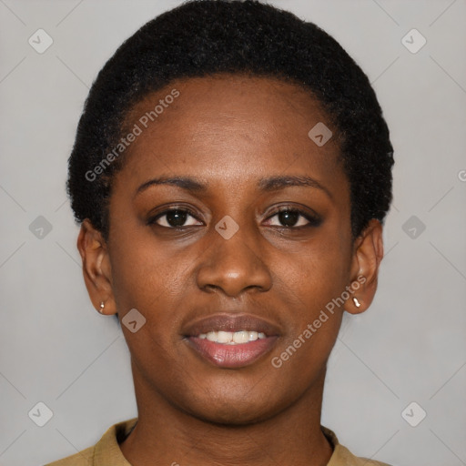 Joyful black young-adult female with short  black hair and brown eyes