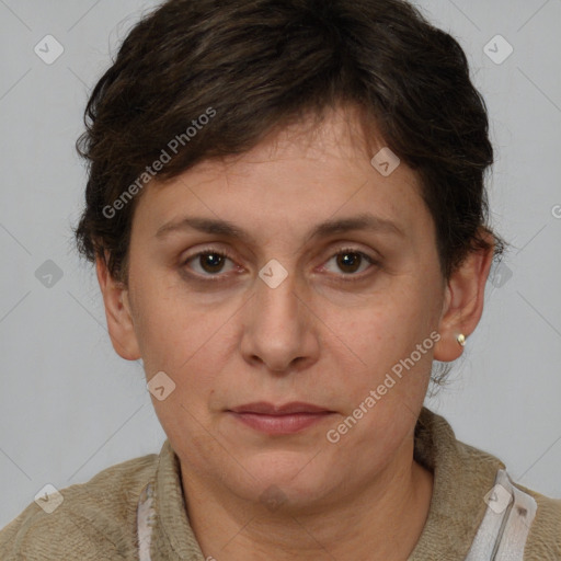 Joyful white adult female with short  brown hair and brown eyes