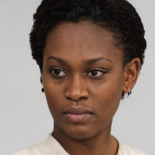Neutral black young-adult female with short  black hair and brown eyes