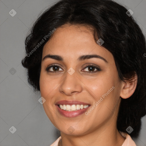 Joyful latino young-adult female with long  brown hair and brown eyes