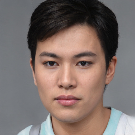 Neutral asian young-adult male with short  brown hair and brown eyes