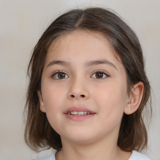 Joyful white child female with medium  brown hair and brown eyes