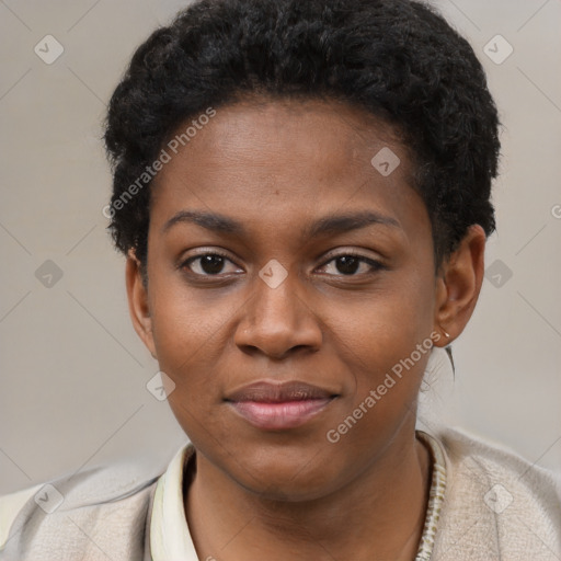 Joyful black young-adult female with short  black hair and brown eyes