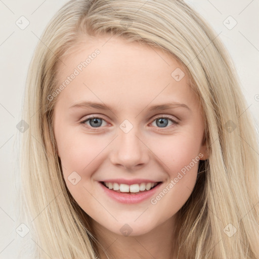 Joyful white young-adult female with long  brown hair and blue eyes