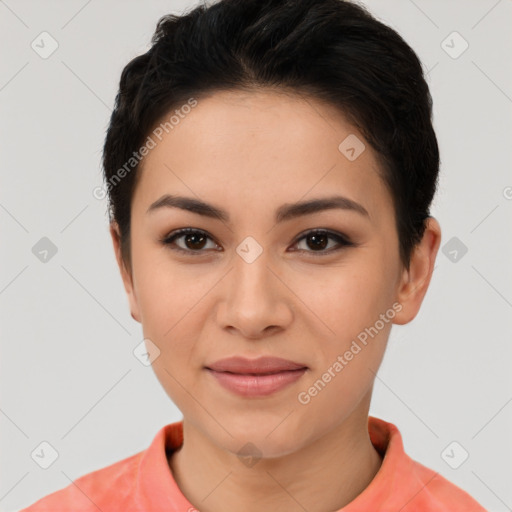 Joyful asian young-adult female with short  black hair and brown eyes