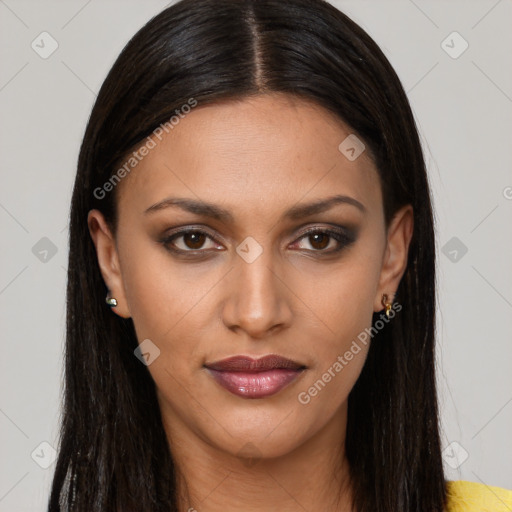 Joyful latino young-adult female with long  brown hair and brown eyes