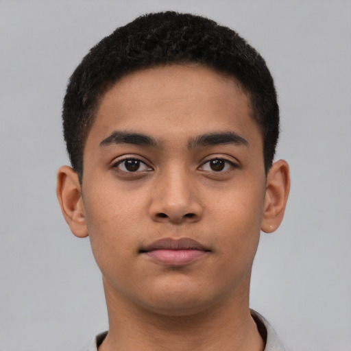 Neutral latino young-adult male with short  brown hair and brown eyes