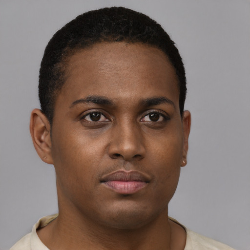 Neutral black young-adult female with short  brown hair and brown eyes