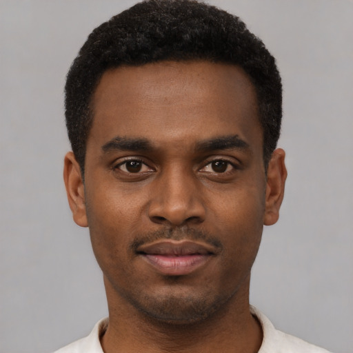 Neutral black young-adult male with short  black hair and brown eyes