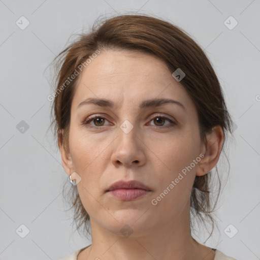 Neutral white young-adult female with medium  brown hair and brown eyes