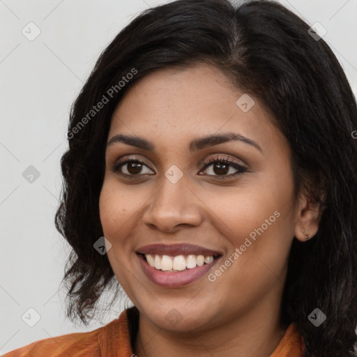 Joyful latino young-adult female with long  brown hair and brown eyes