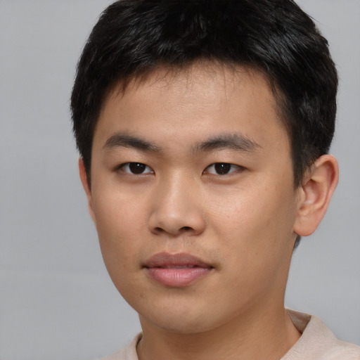 Neutral asian young-adult male with short  brown hair and brown eyes