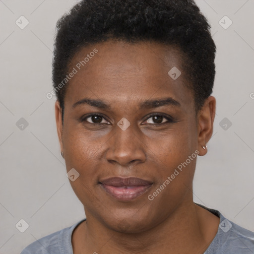 Joyful black young-adult female with short  brown hair and brown eyes