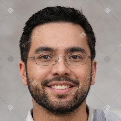 Joyful white young-adult male with short  black hair and brown eyes