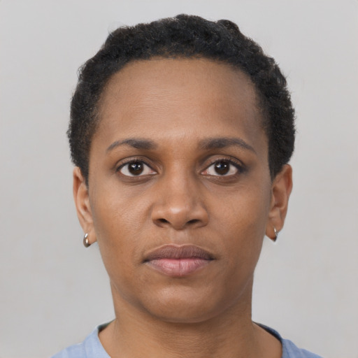 Neutral black young-adult female with short  brown hair and brown eyes
