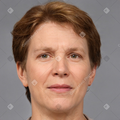 Joyful white adult male with short  brown hair and grey eyes