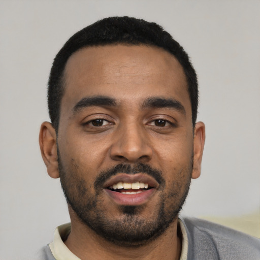 Neutral black young-adult male with short  black hair and brown eyes