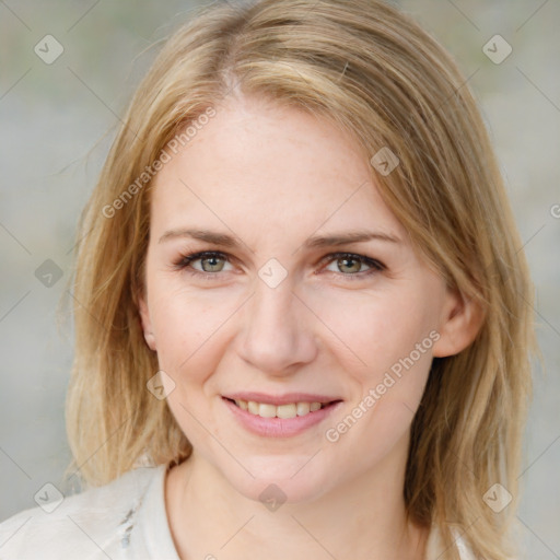 Joyful white young-adult female with medium  brown hair and blue eyes