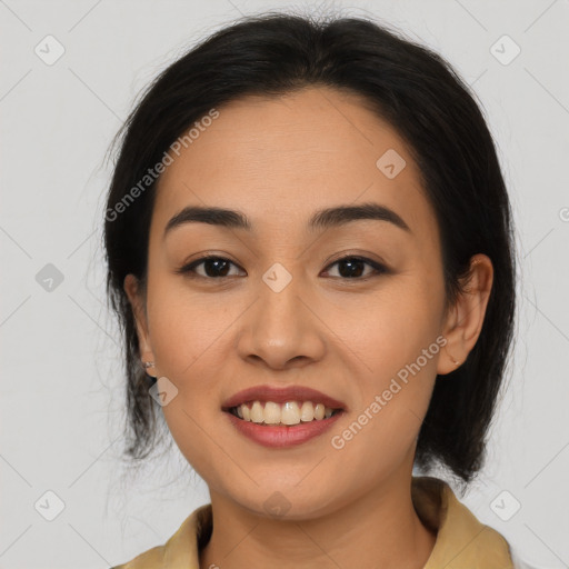 Joyful latino young-adult female with medium  black hair and brown eyes