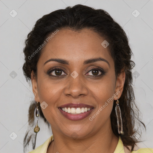 Joyful black young-adult female with medium  brown hair and brown eyes