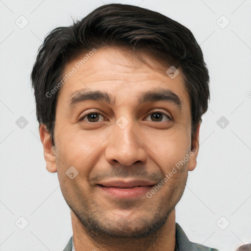 Joyful white adult male with short  brown hair and brown eyes