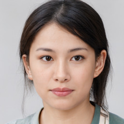 Neutral asian young-adult female with medium  brown hair and brown eyes