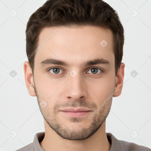 Neutral white young-adult male with short  brown hair and brown eyes