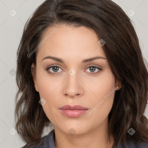 Neutral white young-adult female with long  brown hair and brown eyes