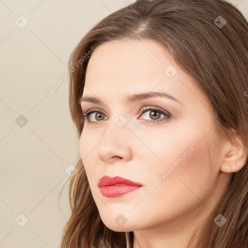 Neutral white young-adult female with long  brown hair and brown eyes