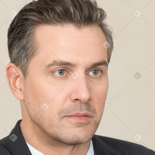 Neutral white adult male with short  brown hair and brown eyes