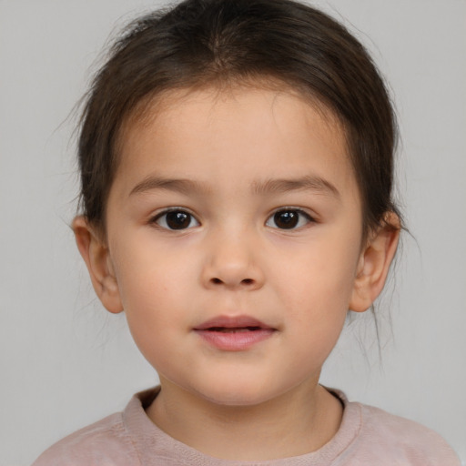 Neutral white child female with medium  brown hair and brown eyes