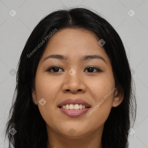 Joyful asian young-adult female with long  brown hair and brown eyes